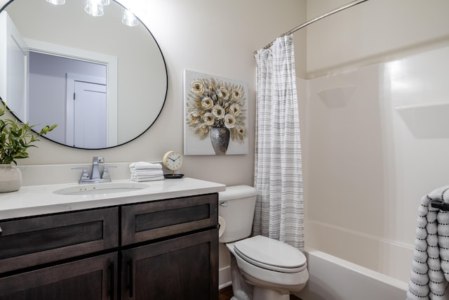 full bathroom featuring vanity, toilet, and shower / bath combo with shower curtain