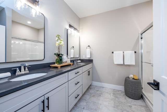 bathroom featuring vanity and walk in shower