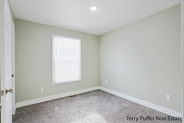 empty room featuring carpet