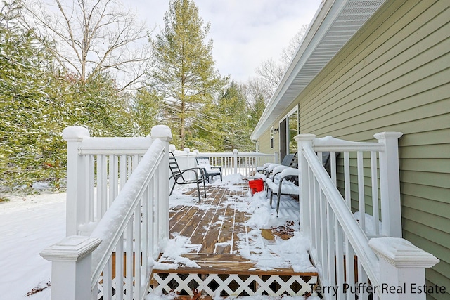 view of snow covered deck