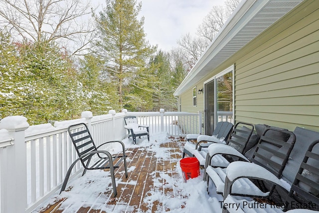 view of snow covered deck