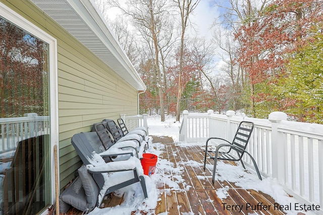 view of snow covered deck