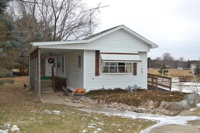 view of front of house with a carport