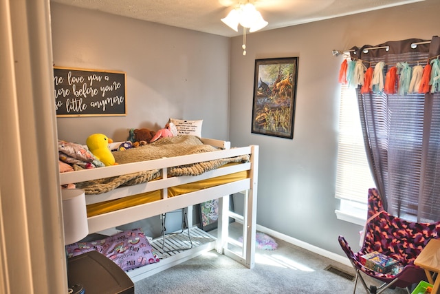 bedroom with carpet floors and ceiling fan