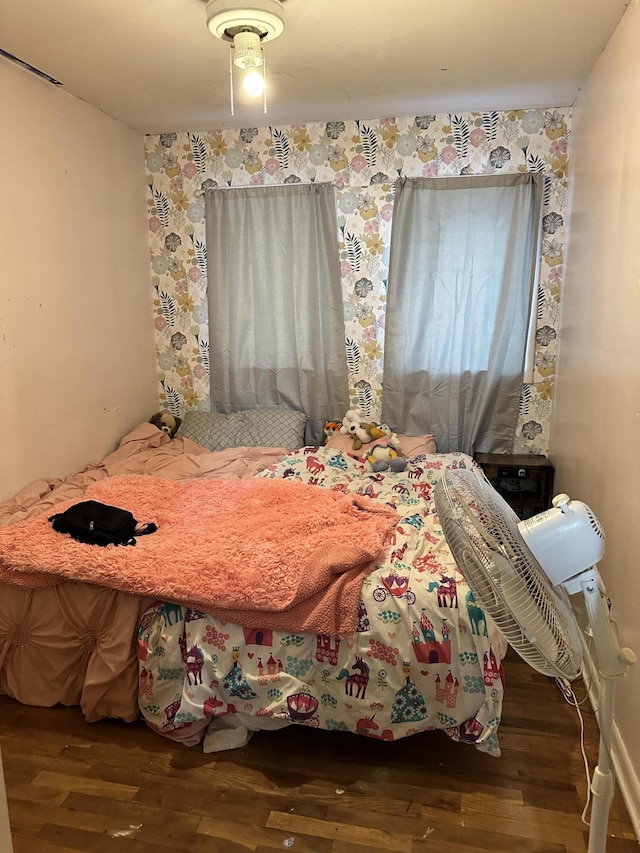 bedroom featuring wood-type flooring