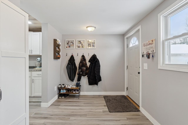 mudroom with light wood-type flooring