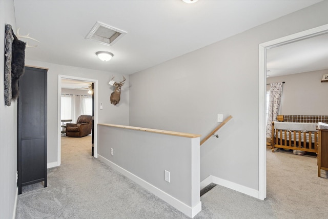 hallway with carpet