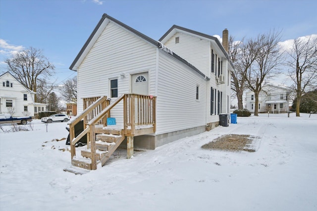 view of snow covered property