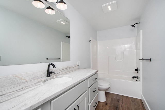 full bathroom with shower / bath combination, vanity, toilet, and wood-type flooring