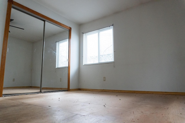 unfurnished bedroom featuring a closet