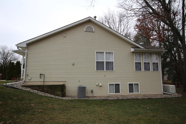 view of home's exterior featuring a yard