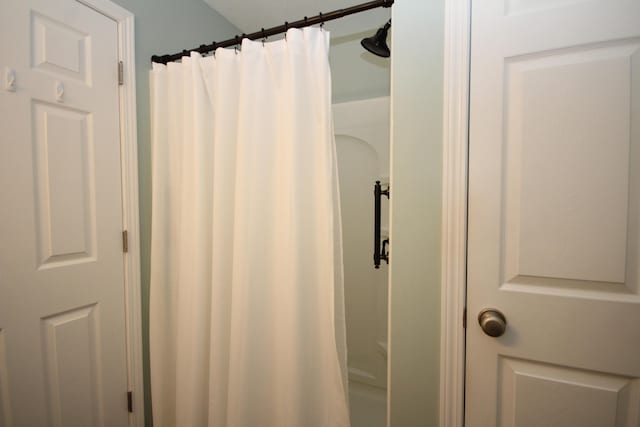 bathroom with walk in shower