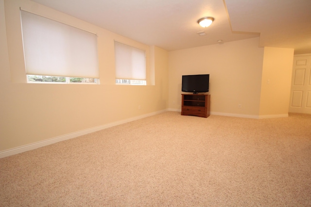 unfurnished room with carpet floors