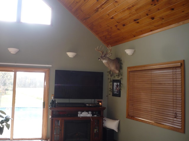 living room with wood ceiling and vaulted ceiling