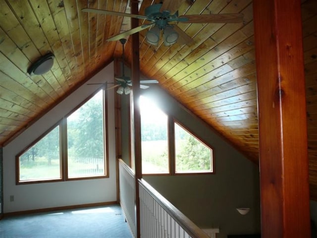 bonus room featuring wooden ceiling, ceiling fan, lofted ceiling, and light colored carpet