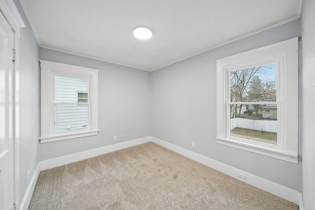 unfurnished room featuring carpet floors