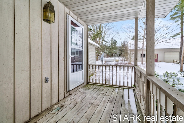 view of snow covered deck