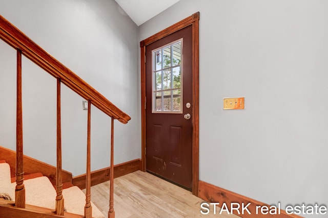 entrance foyer with light hardwood / wood-style floors