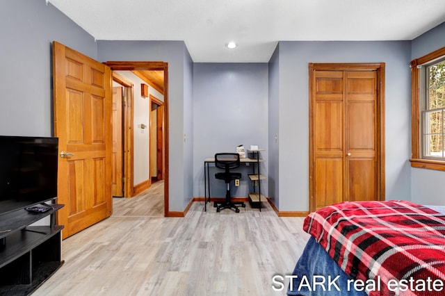 bedroom with light hardwood / wood-style floors