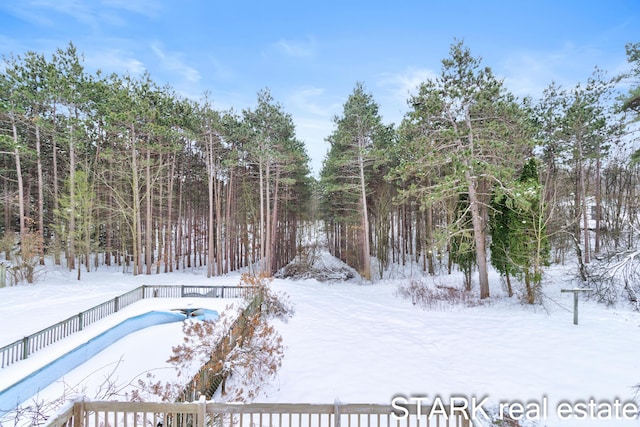 view of snowy yard