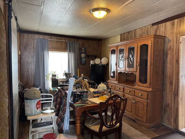 dining area with wood walls