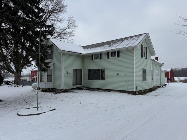 view of snow covered property