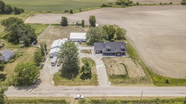 birds eye view of property featuring a rural view