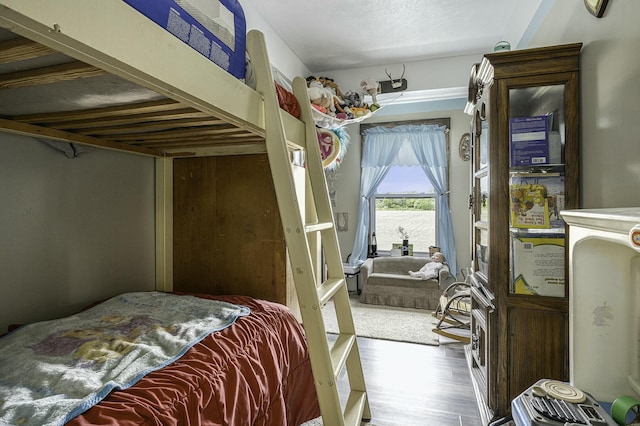 bedroom featuring hardwood / wood-style floors