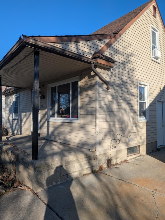 view of home's exterior with a patio area