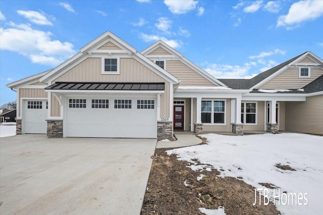 craftsman house with a garage