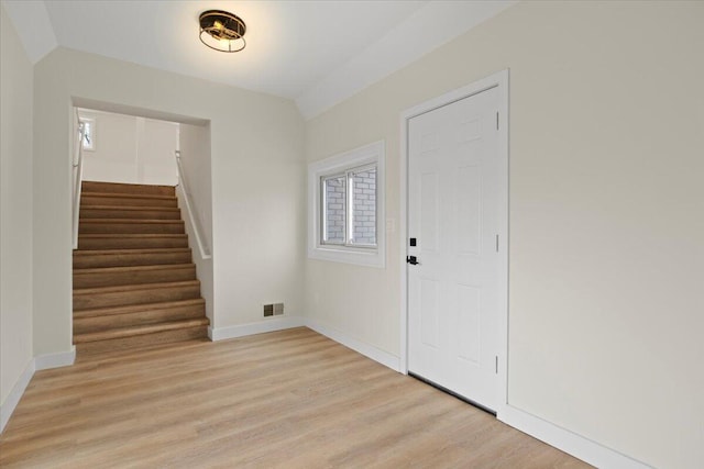 entrance foyer with light wood-type flooring