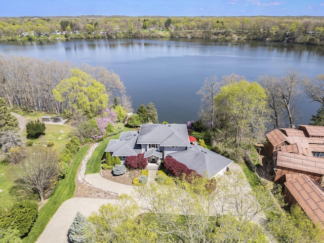 drone / aerial view with a water view