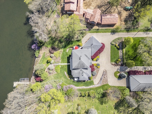 birds eye view of property featuring a water view