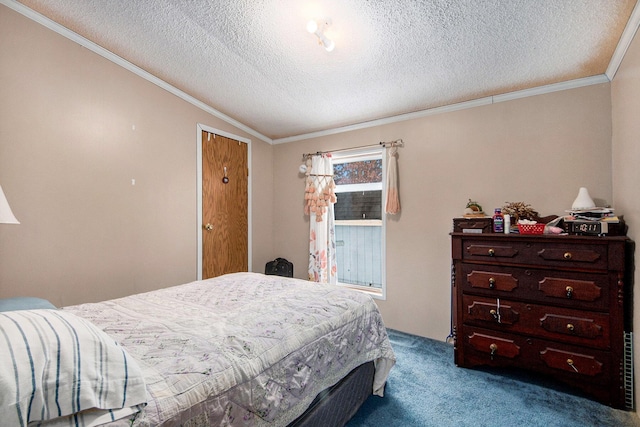 bedroom featuring a textured ceiling, carpet floors, and crown molding