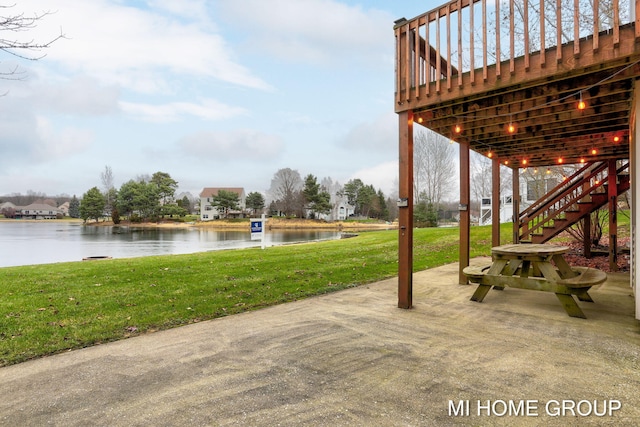 view of patio / terrace with a water view