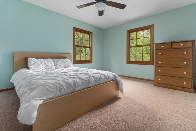 bedroom with carpet floors and ceiling fan