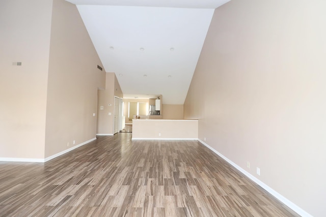 unfurnished living room featuring wood-type flooring