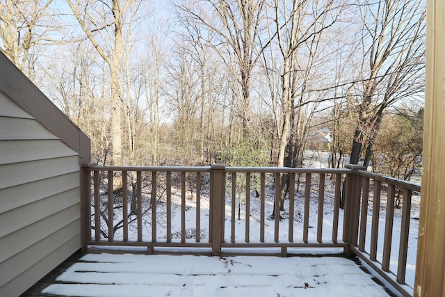 view of snow covered deck