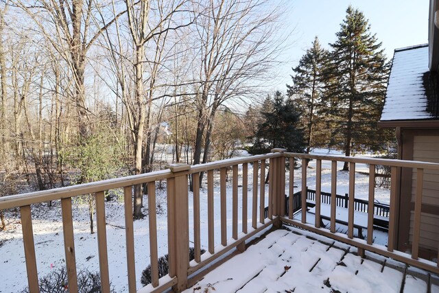 view of snow covered deck