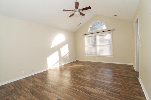 unfurnished room with dark hardwood / wood-style floors, ceiling fan, and vaulted ceiling