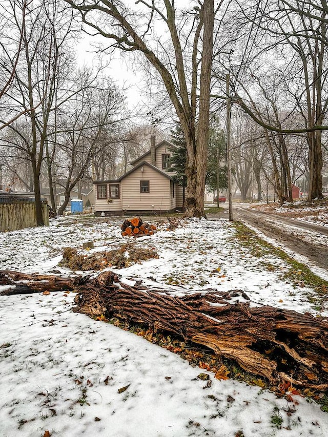 view of yard covered in snow