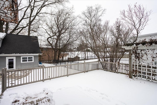 view of yard covered in snow