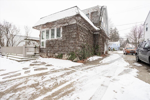 view of snow covered property