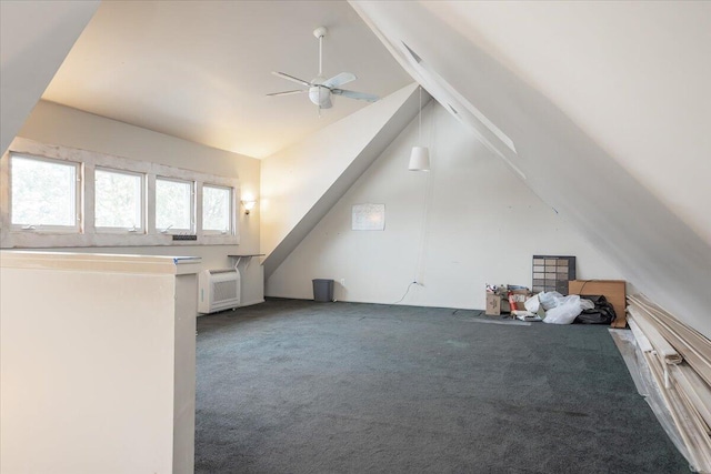 bonus room featuring ceiling fan, carpet, and lofted ceiling