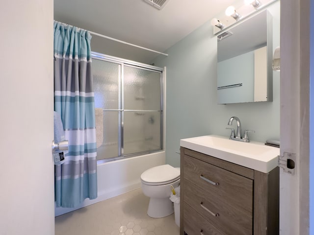 full bathroom with tile patterned floors, vanity, toilet, and enclosed tub / shower combo