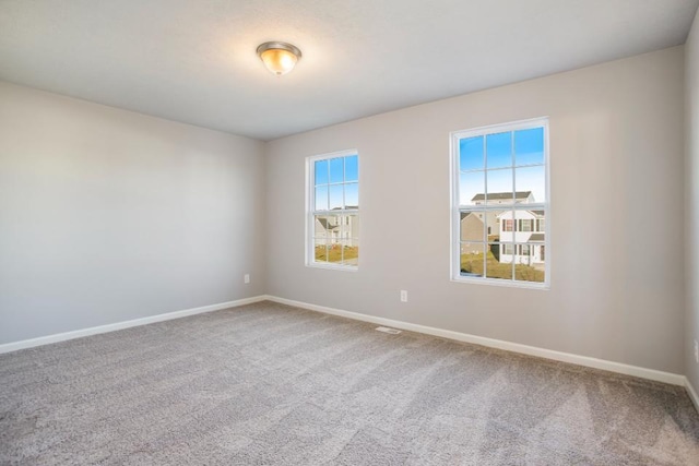 view of carpeted spare room