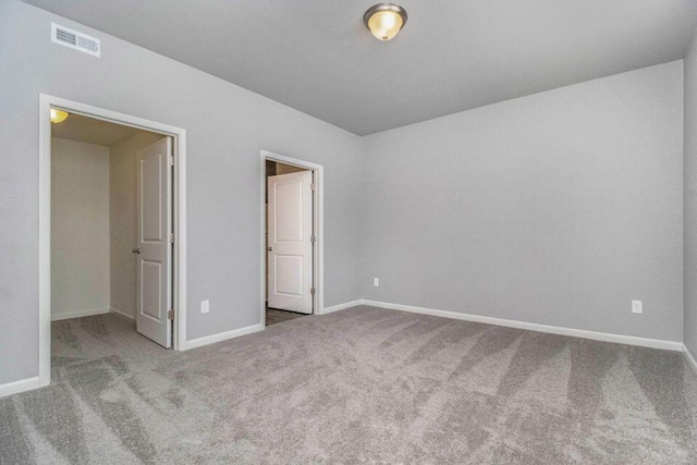 unfurnished bedroom with carpet