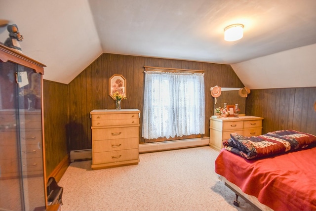 bedroom featuring wood walls, light colored carpet, lofted ceiling, and baseboard heating