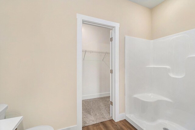 bathroom with vanity, hardwood / wood-style floors, and toilet