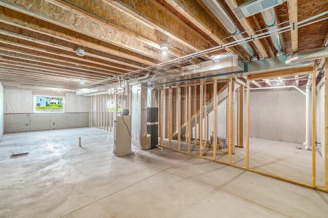 basement featuring water heater